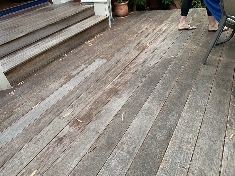 Weathered merbau deck before sanding and oiling