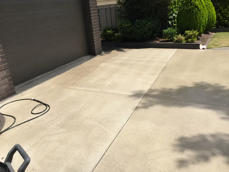 Pressure-washed concrete driveway