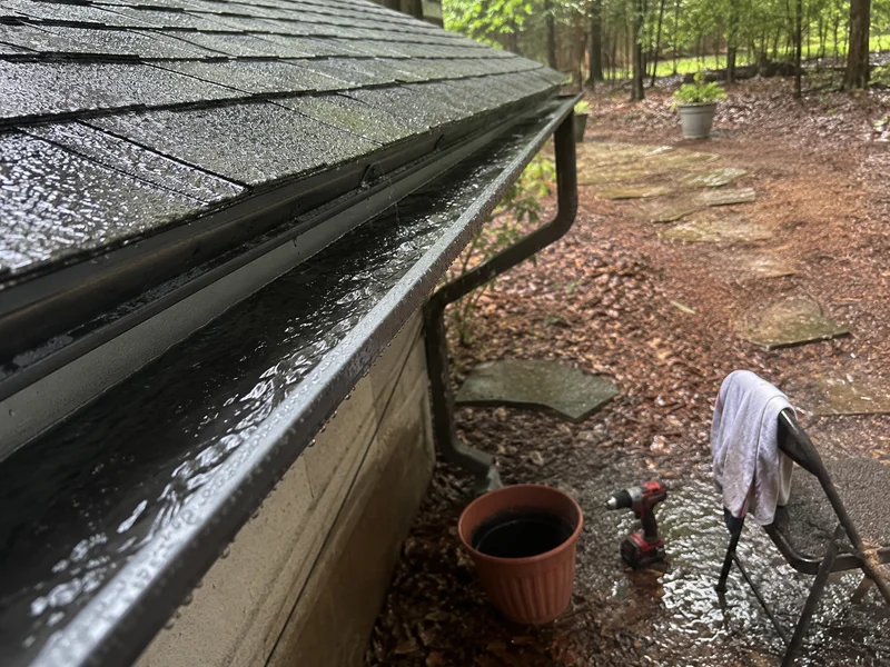 After: Gutters & Roof, the same spot before and after.