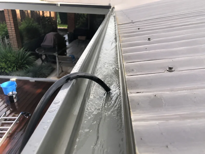 The same gutter run after flushing