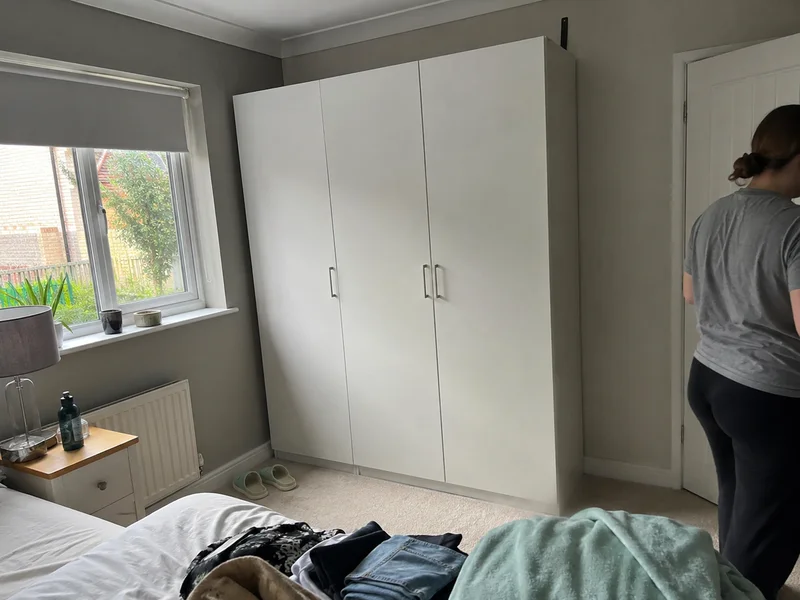 The same wardrobe assembled and anchored to the wall