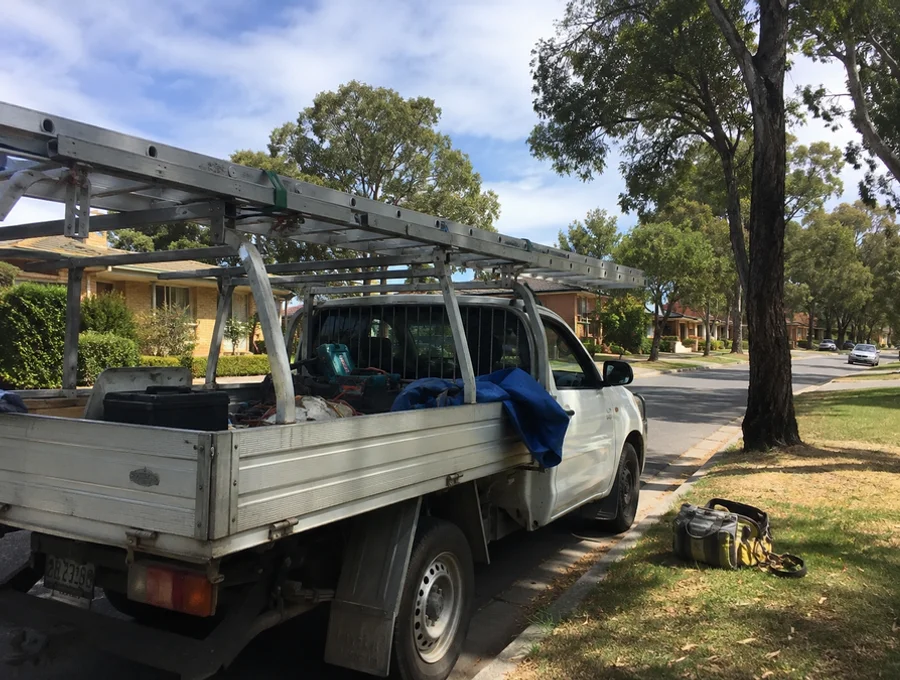 Handyman work ute parked on a Canberra suburban street